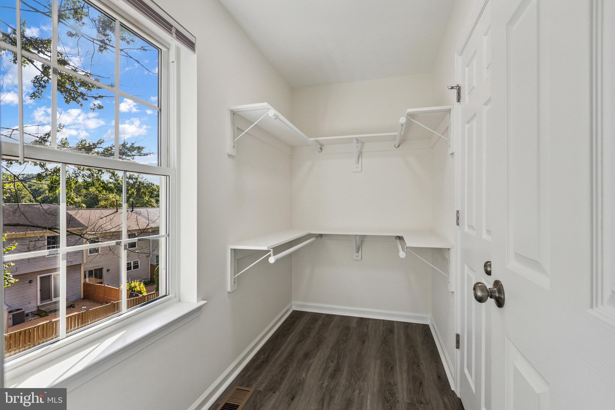 20209 Thunderhead Way Germantown, MD 20874 - Photo 17 of 26 a view of a room with a window and wooden floor
