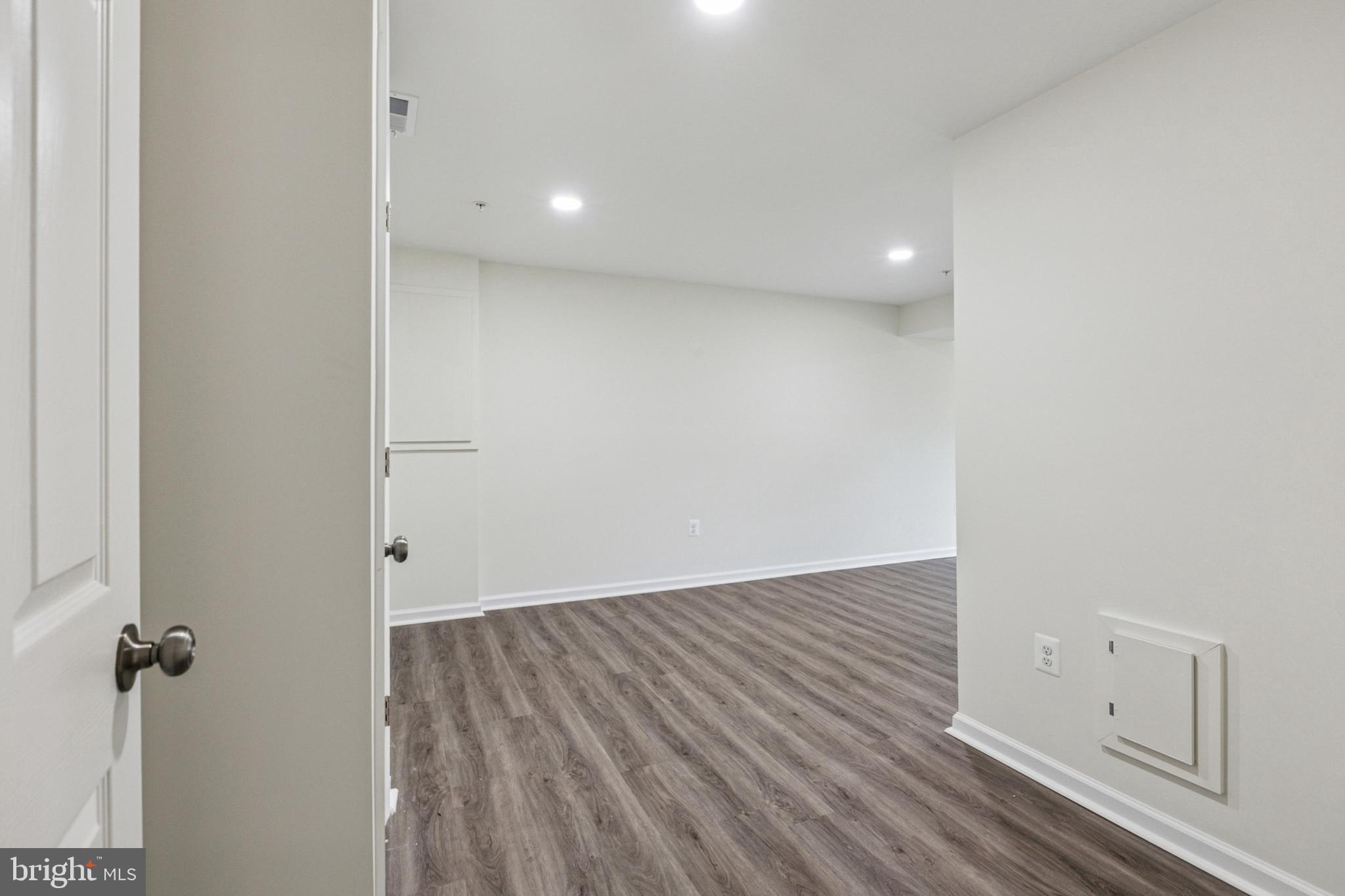 20209 Thunderhead Way Germantown, MD 20874 - Photo 23 of 26 a view of a room with wooden floor