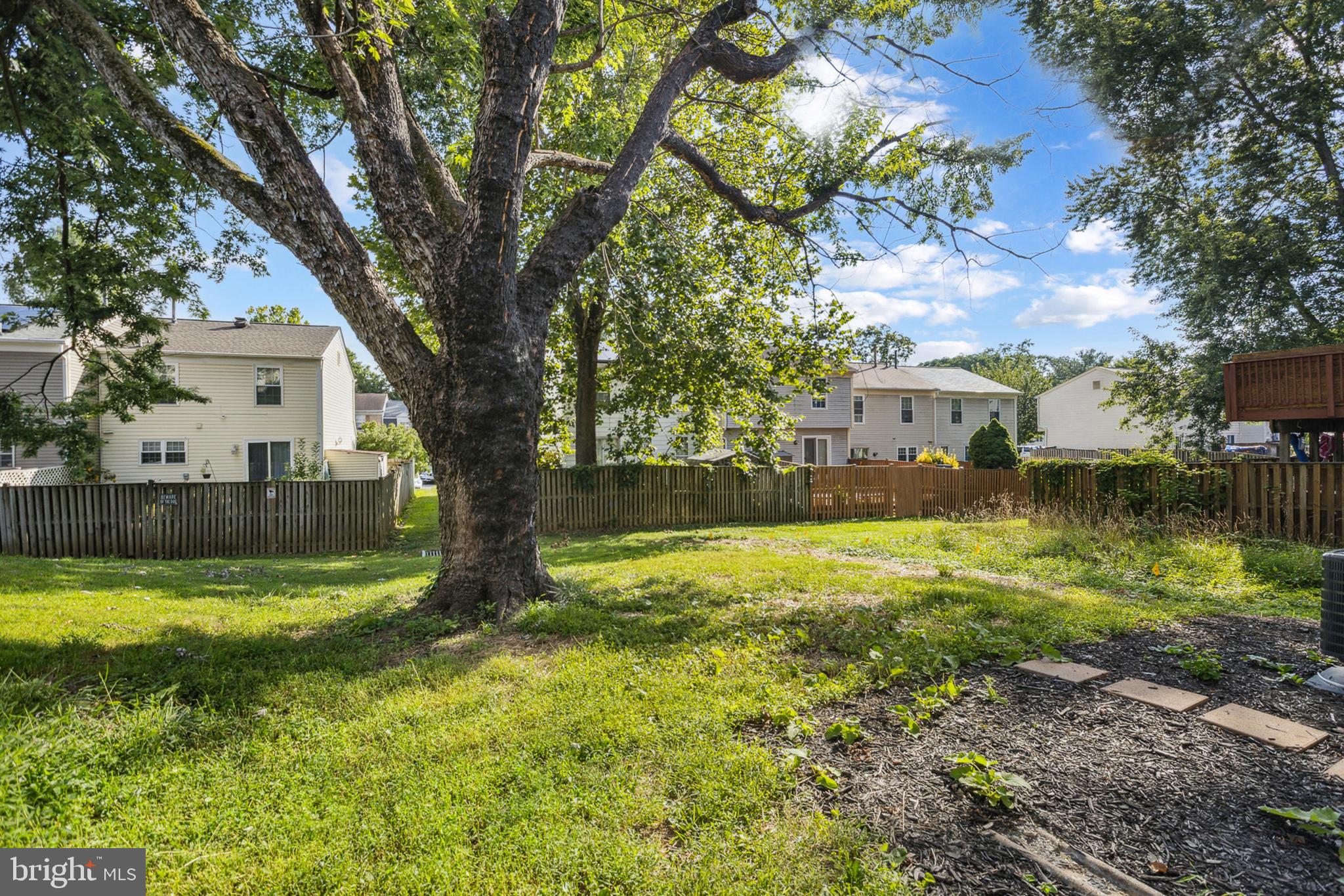 20209 Thunderhead Way Germantown, MD 20874 - Photo 25 of 26 a view of a house with swimming pool and a yard