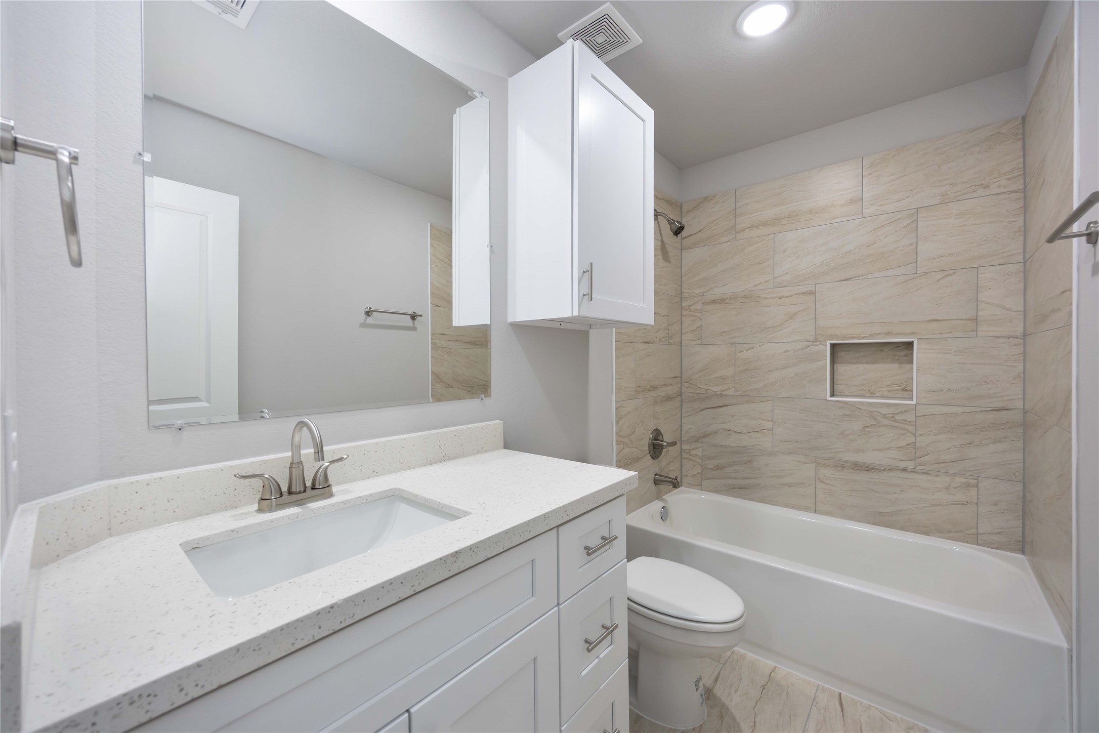 7987 Chateau Street, Unit A Houston, TX 77028 - Photo 22 of 24 a bathroom with a sink a toilet and shower