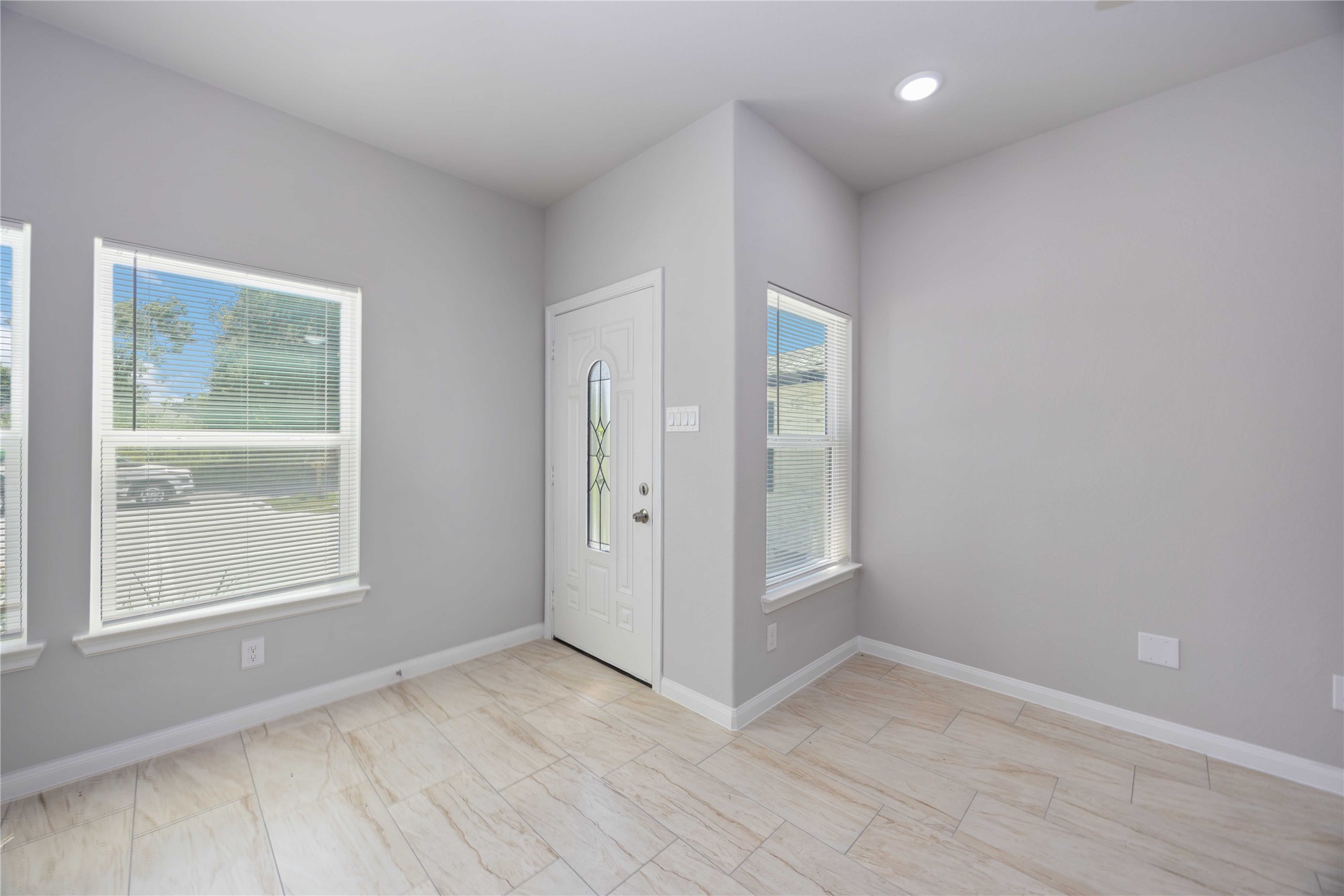 7987 Chateau Street, Unit A Houston, TX 77028 - Photo 3 of 24 an empty room with windows