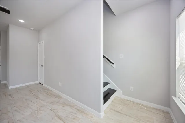 a view of entryway with stairs