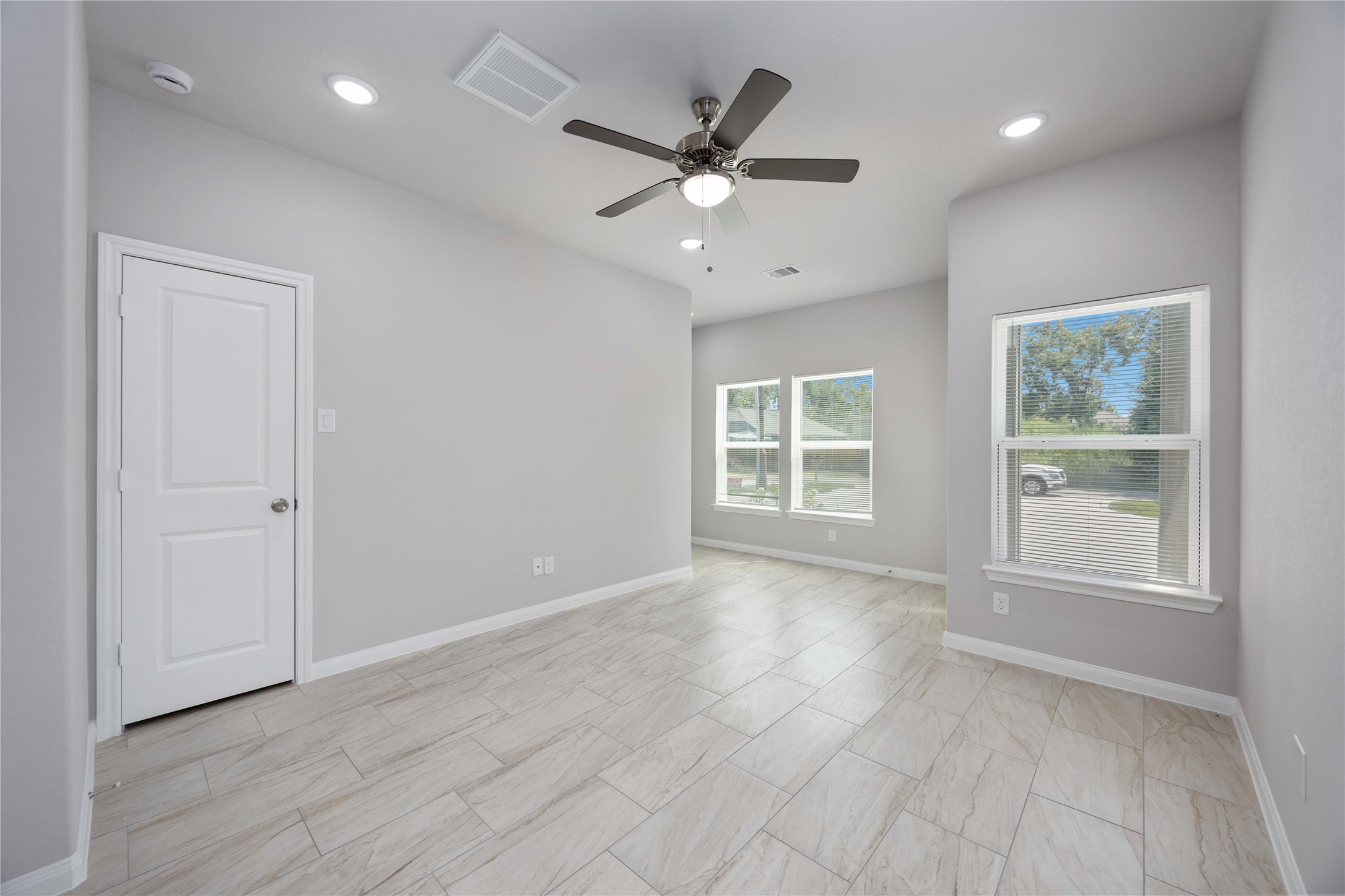 7987 Chateau Street, Unit A Houston, TX 77028 - Photo 7 of 24 a view of an empty room with a window