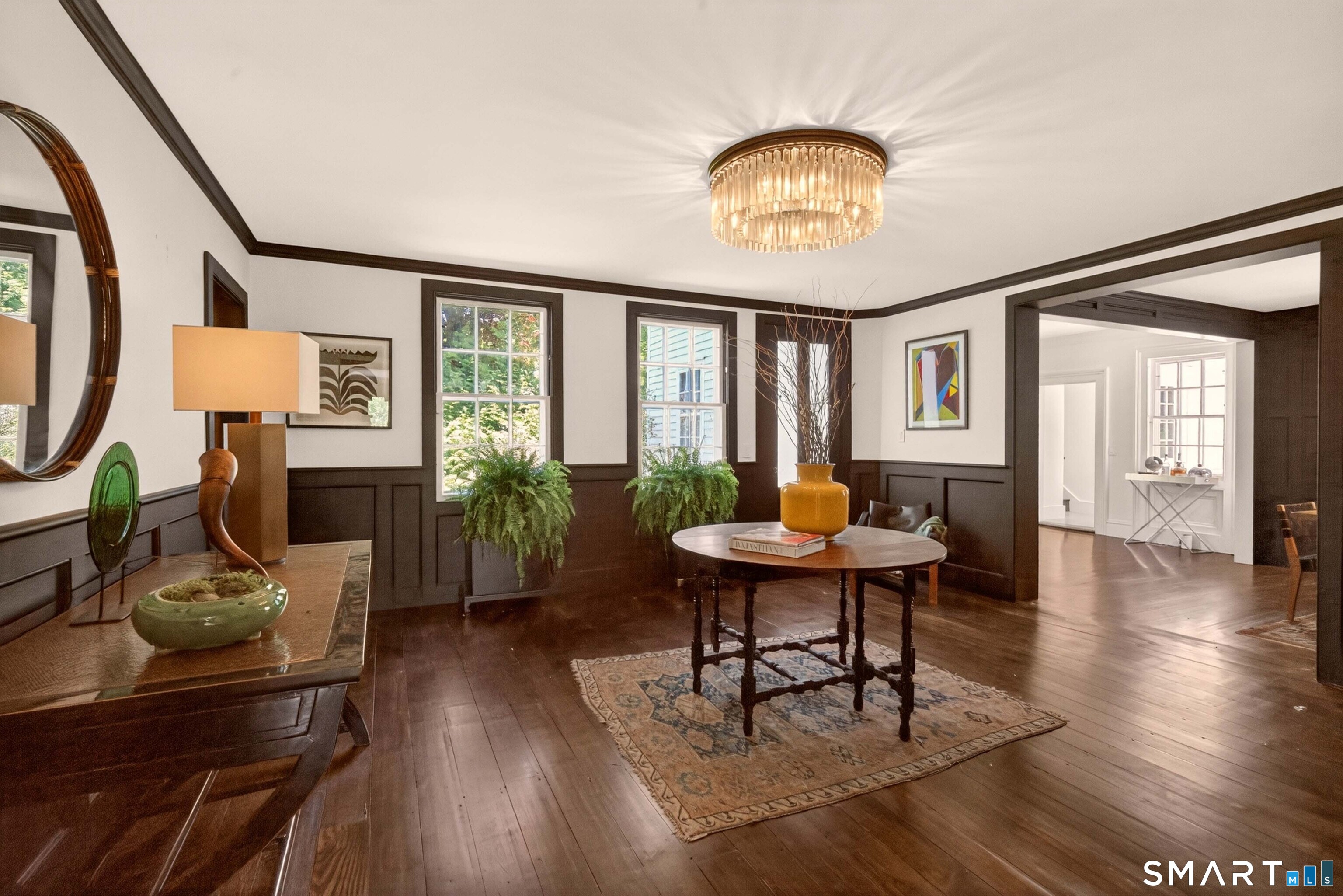 100 North Main Street Kent, CT 06757 - Photo 15 of 40 a workspace with furniture a chandelier and wooden floor