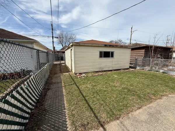 a house view with a backyard space