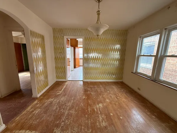 a view of an empty room and window