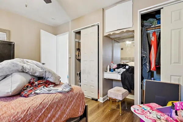 a bathroom with a sink vanity and a mirror