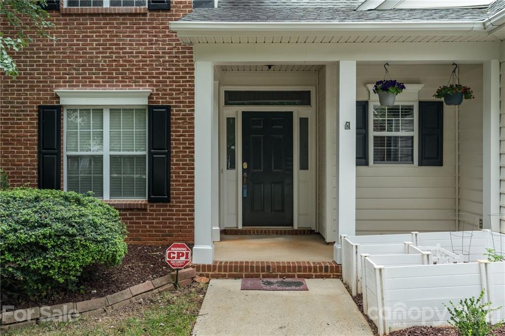6925 Reedy Creek Road Charlotte, NC 28215 - Photo 32 of 34 a front view of a house