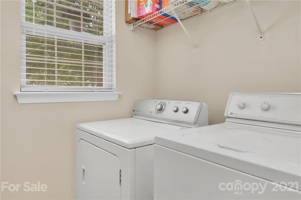 6925 Reedy Creek Road Charlotte, NC 28215 - Photo 5 of 34 a utility room with dryer and washer