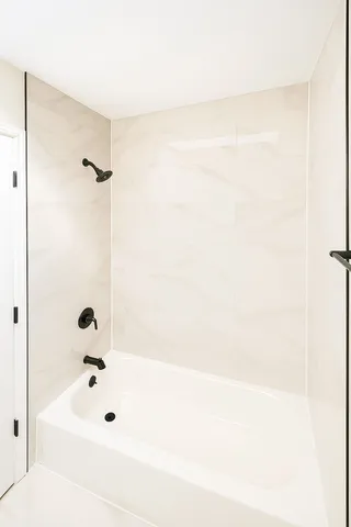 a bathroom with a bathtub
