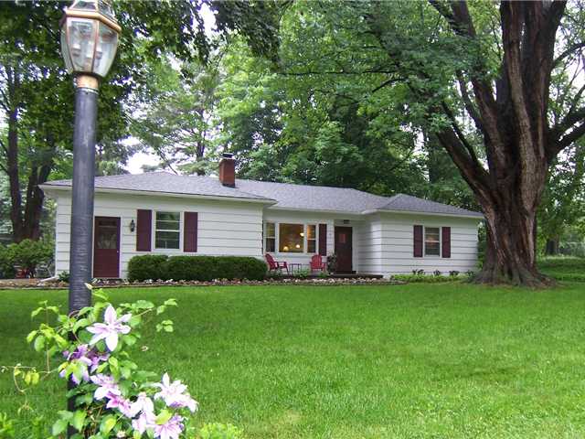 11 Winding Road Pittsford, NY 14618 - Photo 1 of 1 Exterior Front. 11 Winding Road. Private lot with
