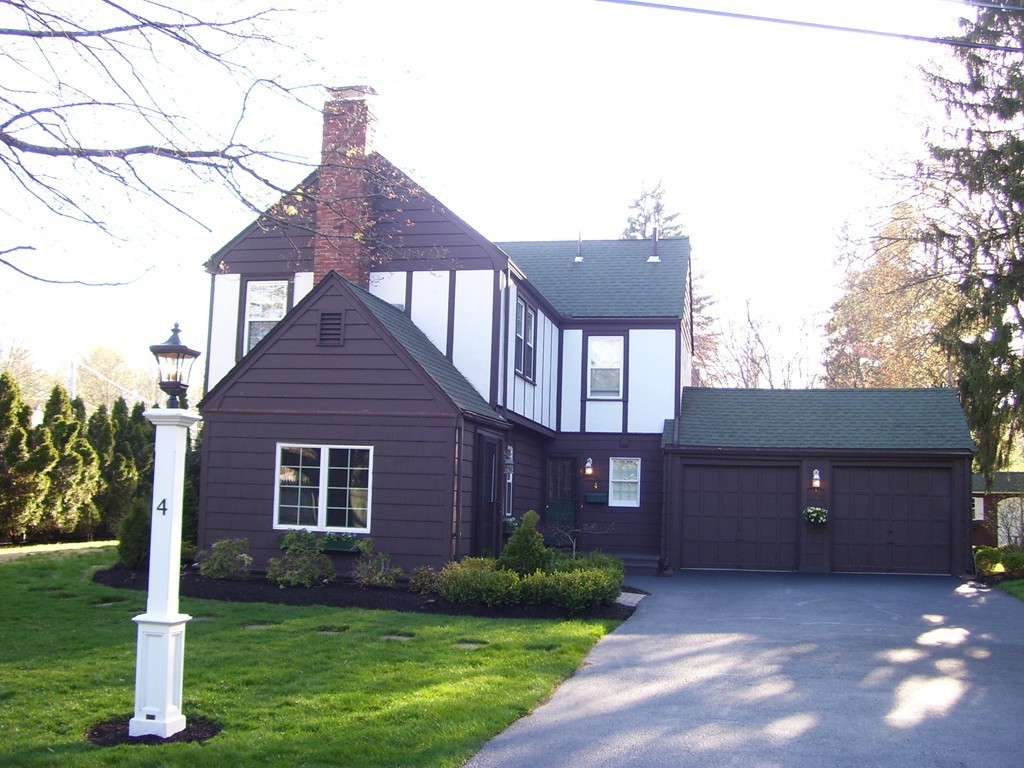 4 Roberts Road Wellesley, MA 02481 - Photo 5 of 29 a front view of a house with a yard