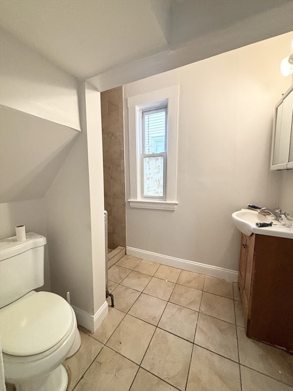35 Madison Street Malden, MA 02148 - Photo 10 of 16 a bathroom with a toilet and a sink