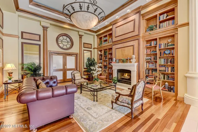 a view of a patio with table and chairs and potted plants