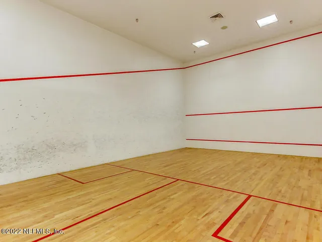 a view of a livingroom with furniture and a potted plant