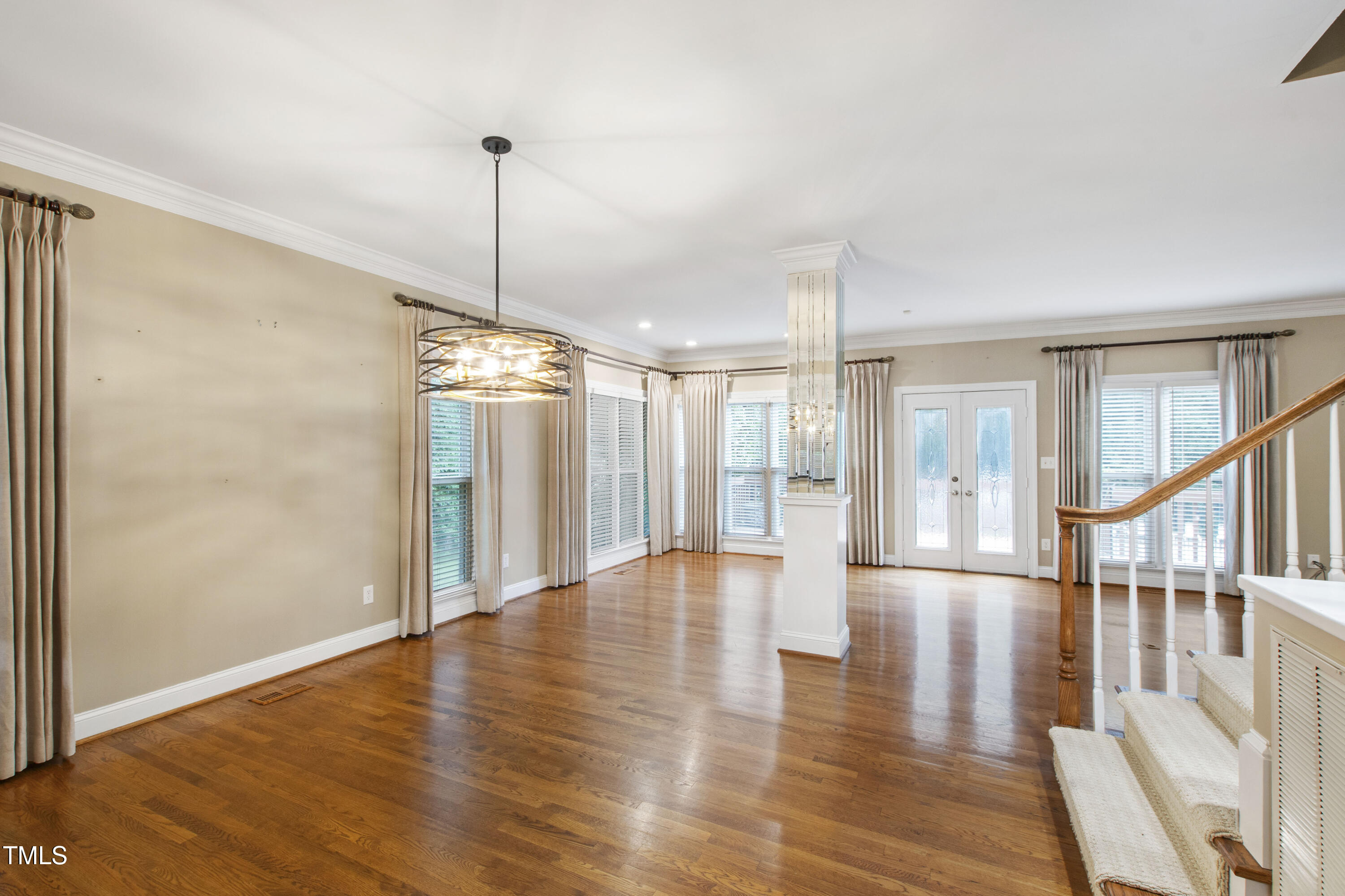 2301 Upper Oaks Way Raleigh, NC 27615 - Photo 20 of 55 a view of an entryway with wooden floor