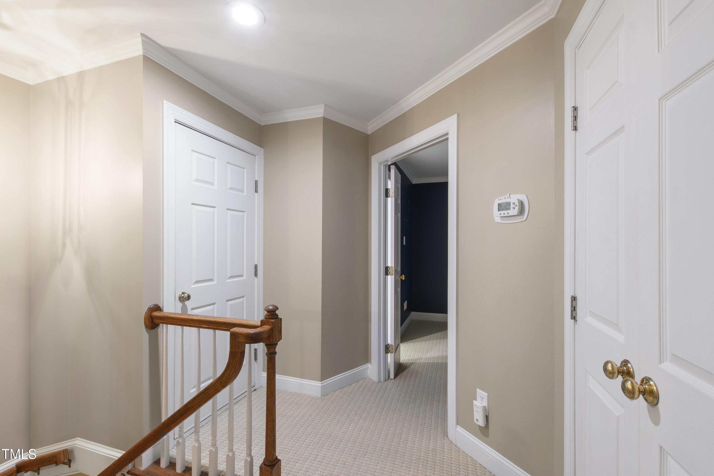 2301 Upper Oaks Way Raleigh, NC 27615 - Photo 33 of 55 a view of an entryway with staircase