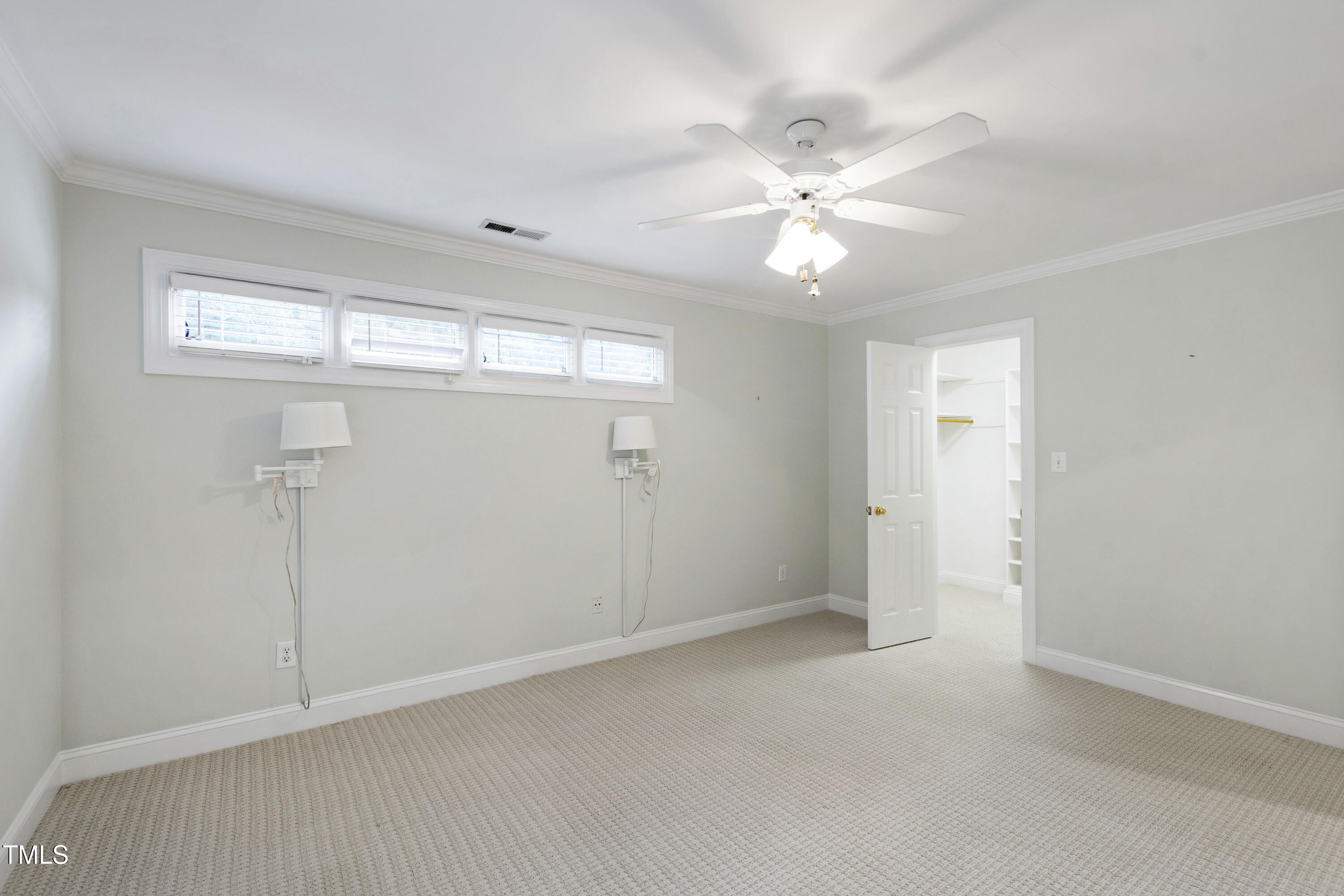 2301 Upper Oaks Way Raleigh, NC 27615 - Photo 35 of 55 a view of an empty room with a window