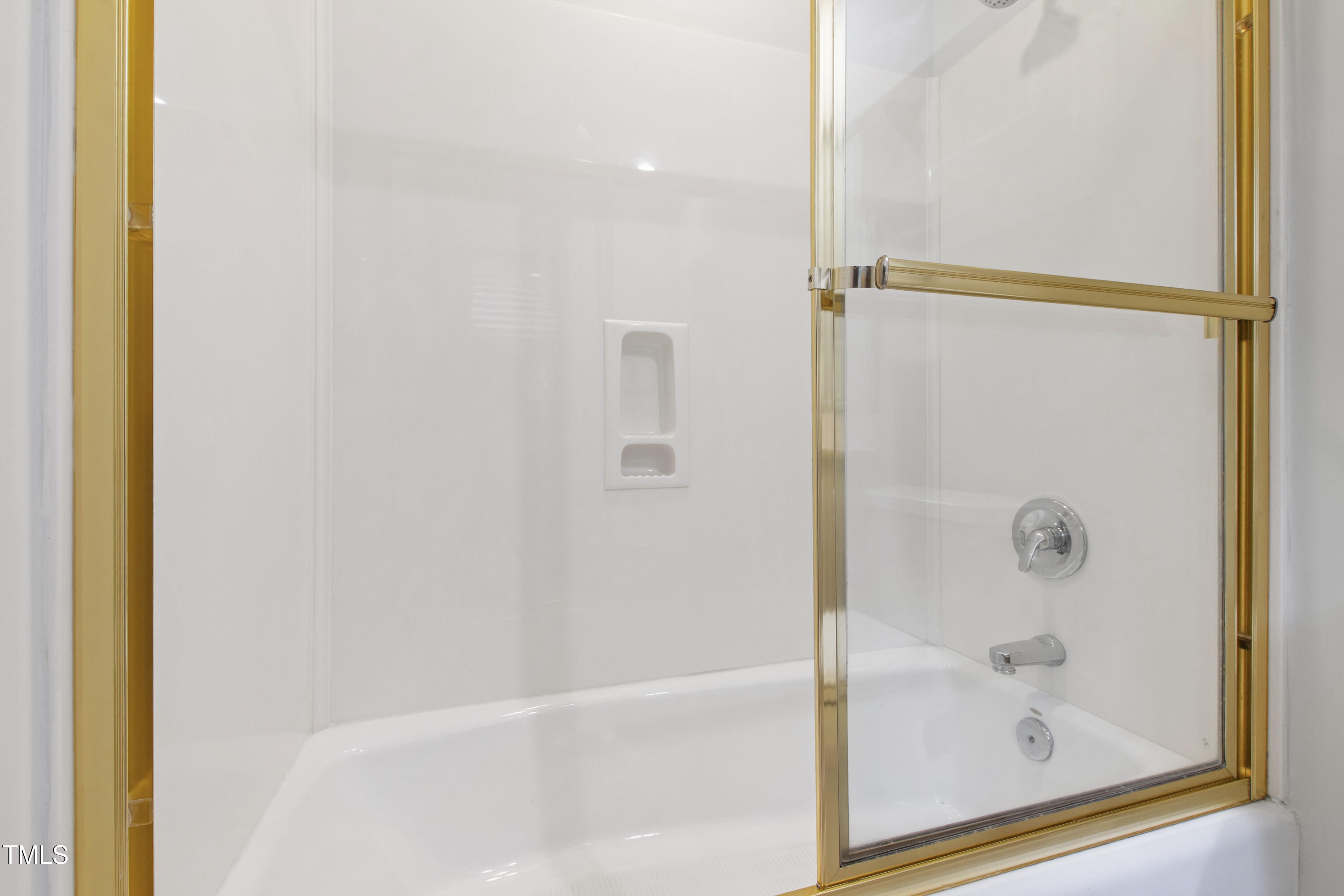 2301 Upper Oaks Way Raleigh, NC 27615 - Photo 38 of 55 a bathroom with a glass shower door