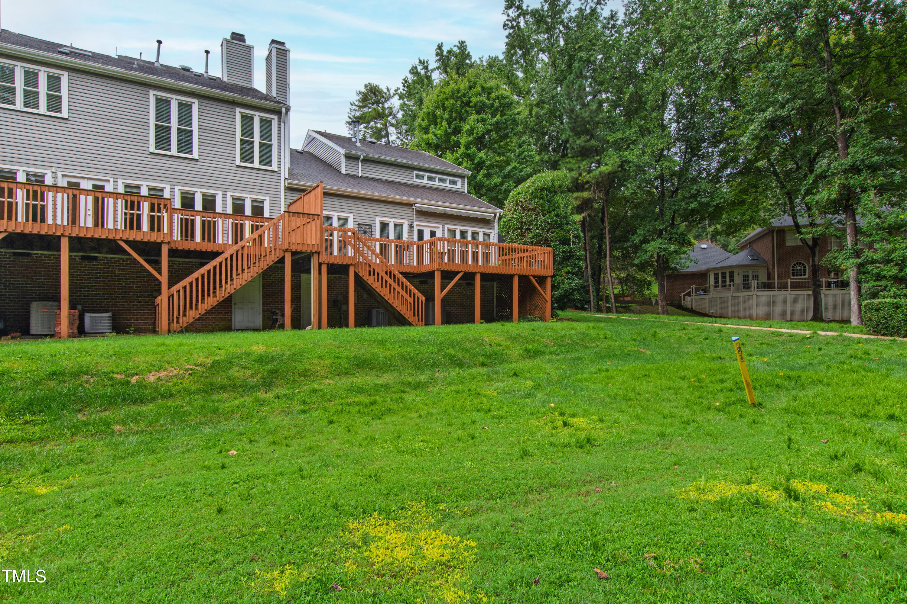 2301 Upper Oaks Way Raleigh, NC 27615 - Photo 48 of 55 a front view of house with yard and green space