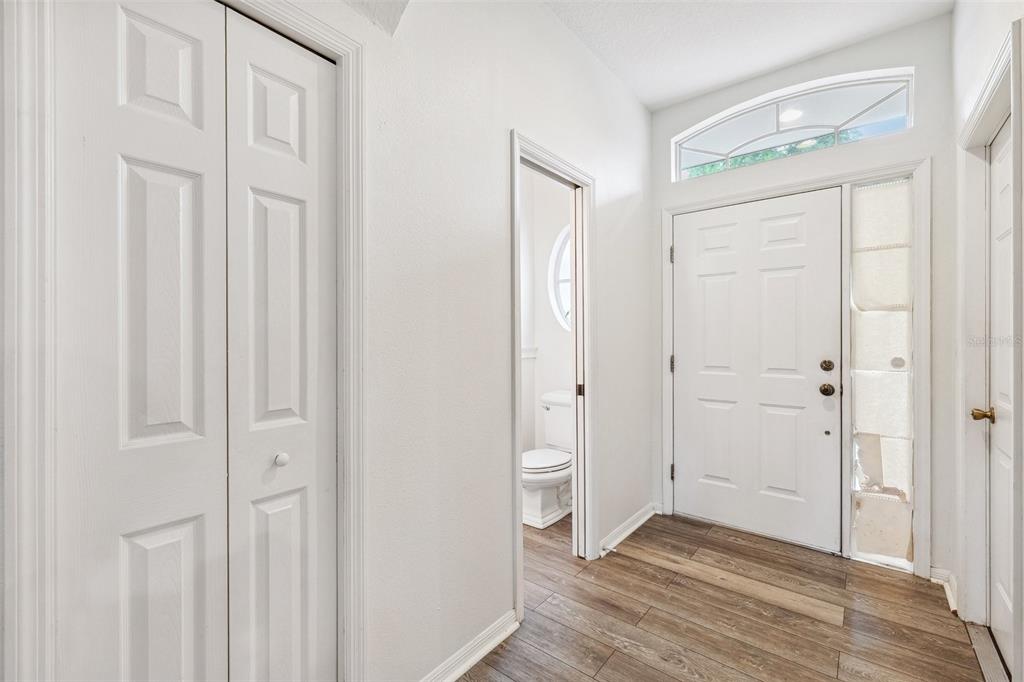 3209 Meta Court Largo, FL 33771 - Photo 3 of 24 a view of a bathroom with wooden floor