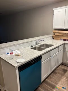 1610 Pima Trail, Unit A Harker Heights, TX 76548 - Photo 10 of 22 a kitchen with a sink and cabinets