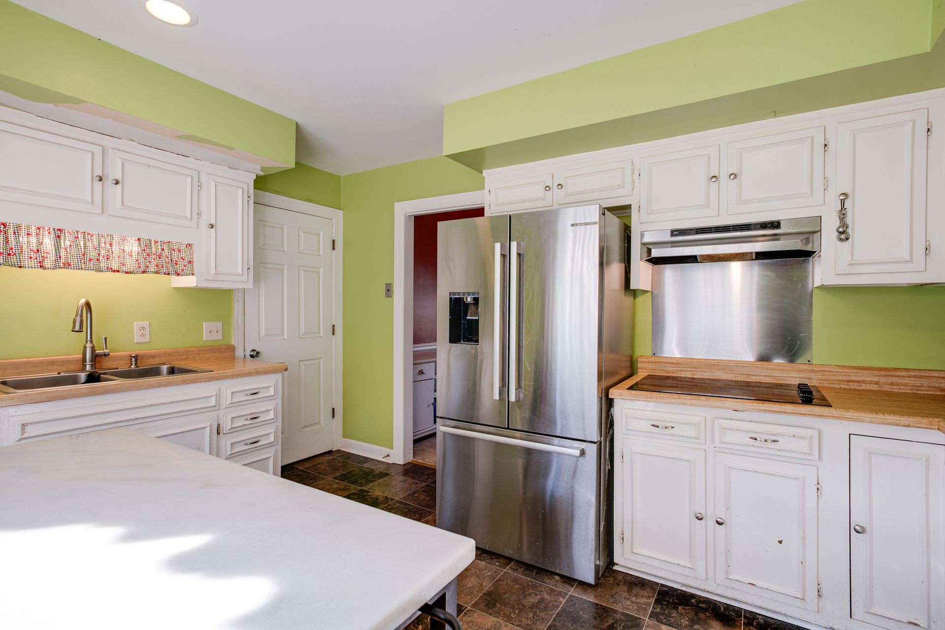 101 Pinehurst Drive Franklin, TN 37069 - Photo 11 of 41 a kitchen with stainless steel appliances a refrigerator sink and cabinets
