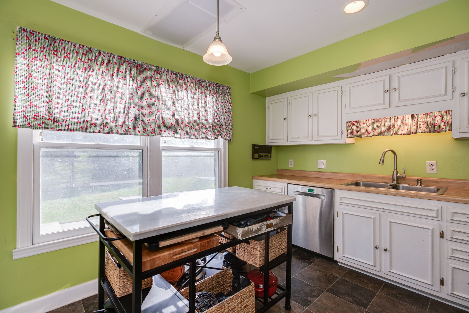 101 Pinehurst Drive Franklin, TN 37069 - Photo 12 of 41 a kitchen with a wooden table chairs and a window