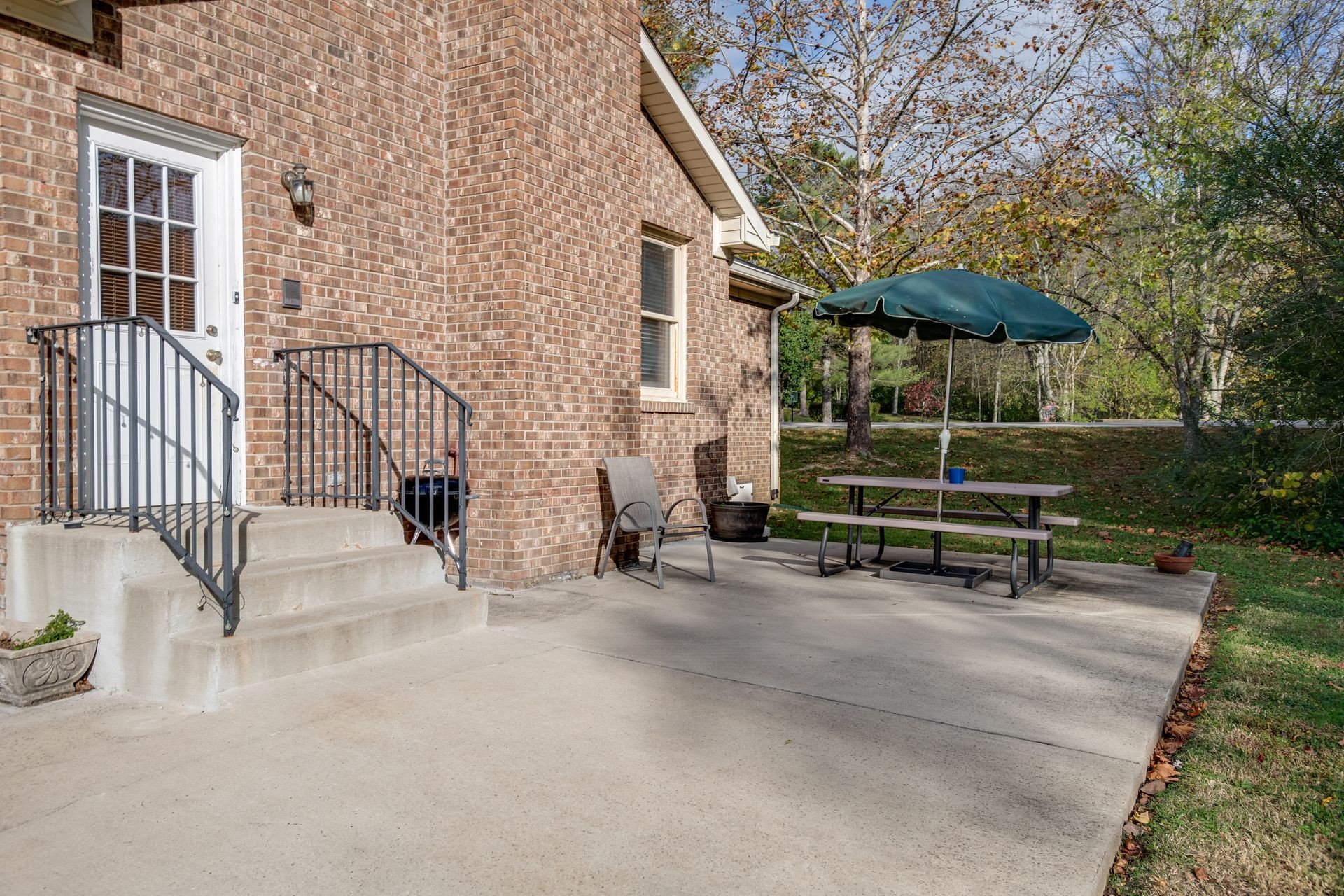 101 Pinehurst Drive Franklin, TN 37069 - Photo 20 of 41 an outdoor space with patio and white umbrellas