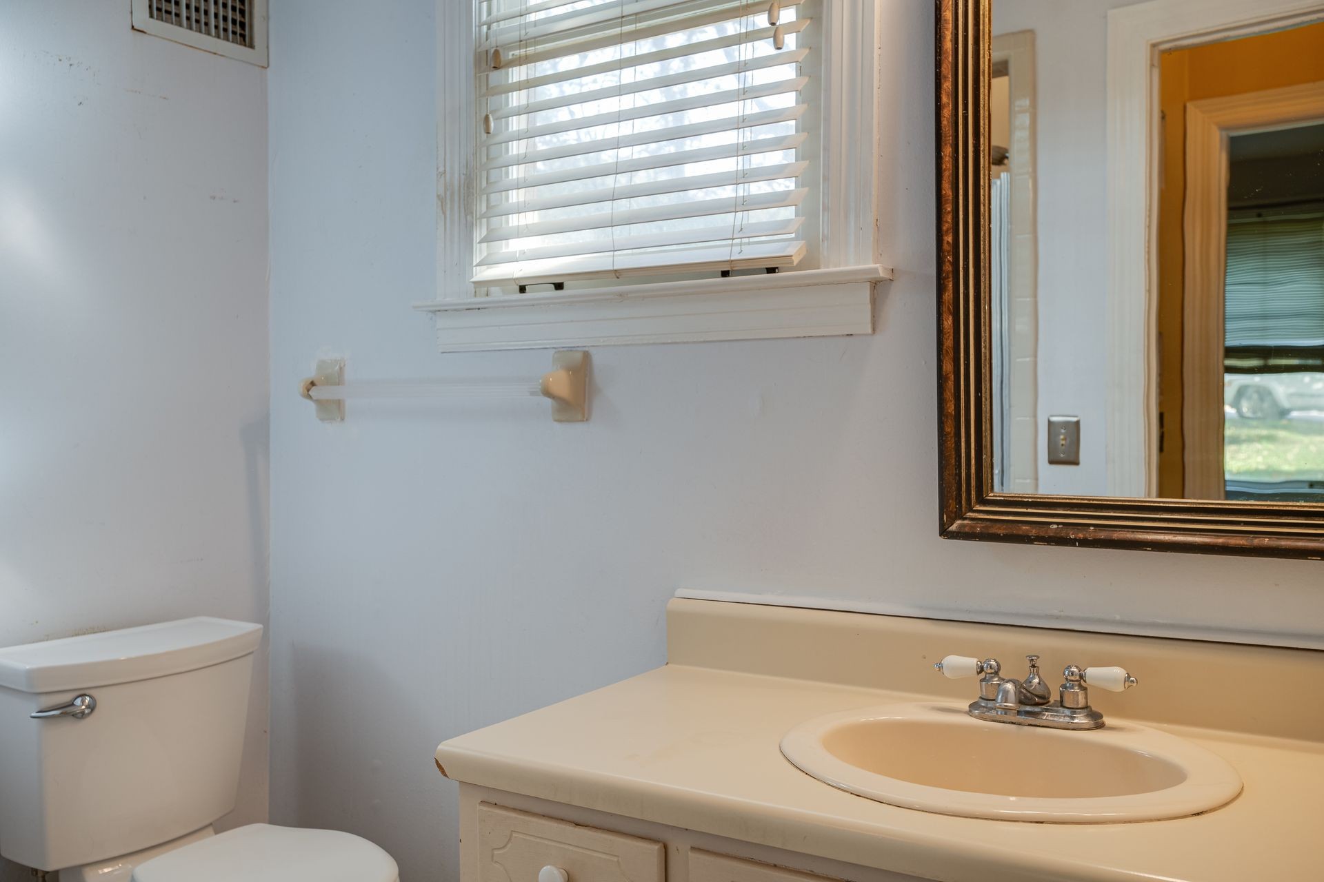 101 Pinehurst Drive Franklin, TN 37069 - Photo 21 of 41 a bathroom with a sink a toilet and a mirror