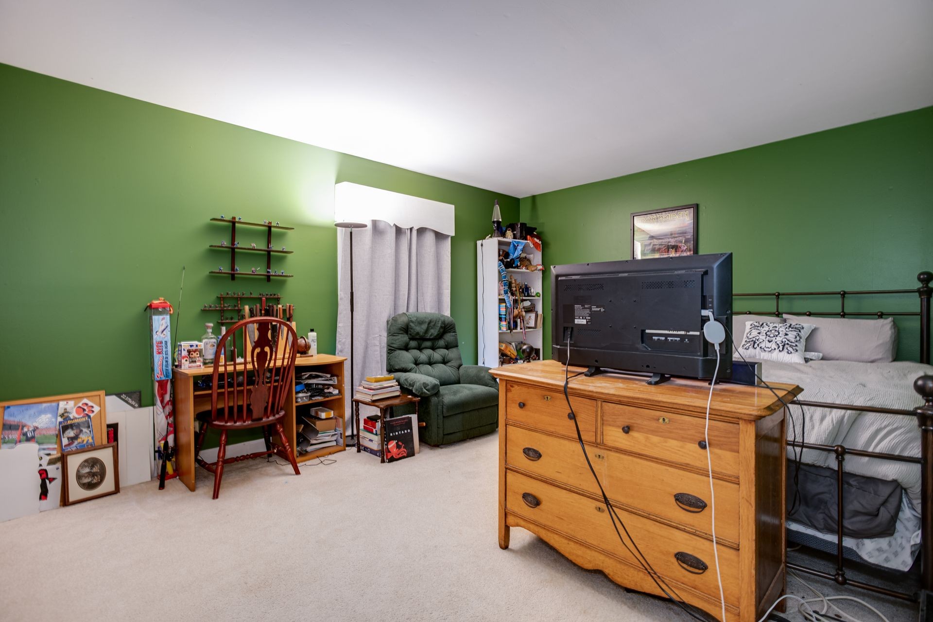 101 Pinehurst Drive Franklin, TN 37069 - Photo 33 of 41 a bed room with furniture and a flat tv screen on dresser