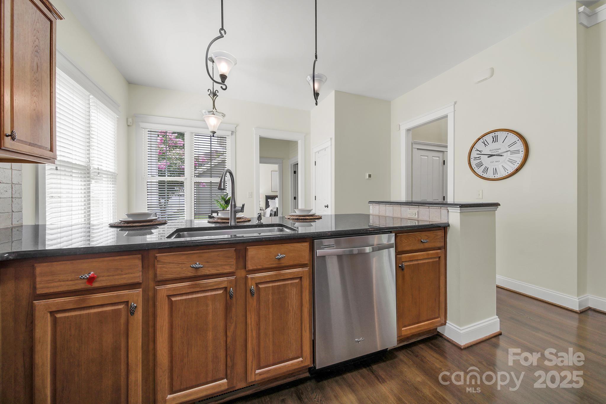 1855 2nd Baxter Crossing Fort Mill, SC 29708 - Photo 11 of 48 a bathroom with a granite countertop sink and a large mirror
