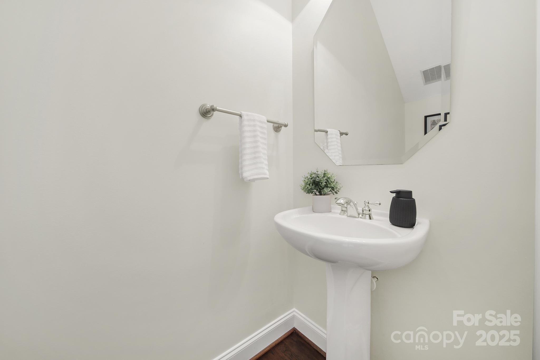 1855 2nd Baxter Crossing Fort Mill, SC 29708 - Photo 14 of 48 a bathroom with a sink and a mirror