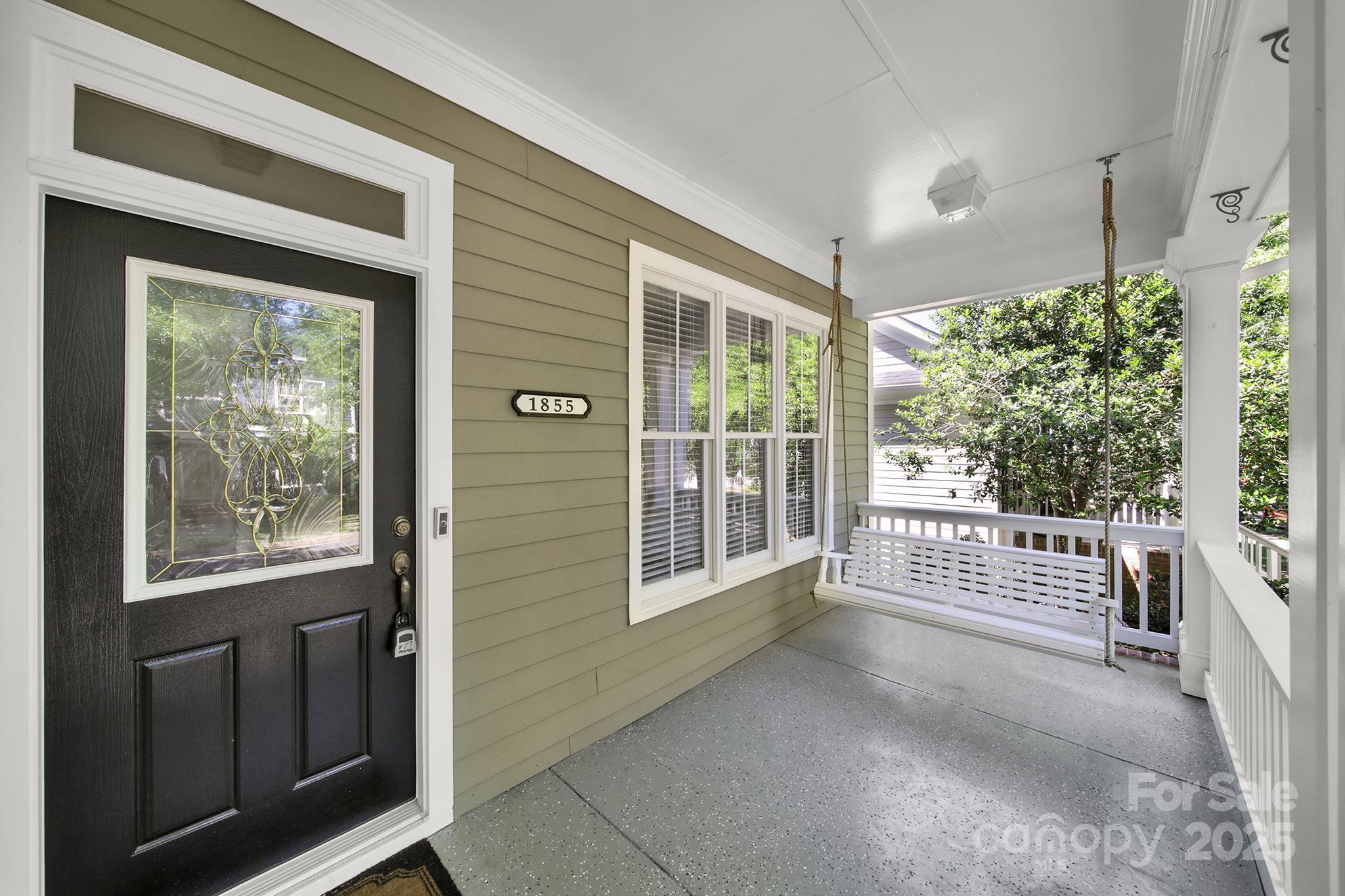 1855 2nd Baxter Crossing Fort Mill, SC 29708 - Photo 2 of 48 a view of a porch with wooden floor and outdoor space