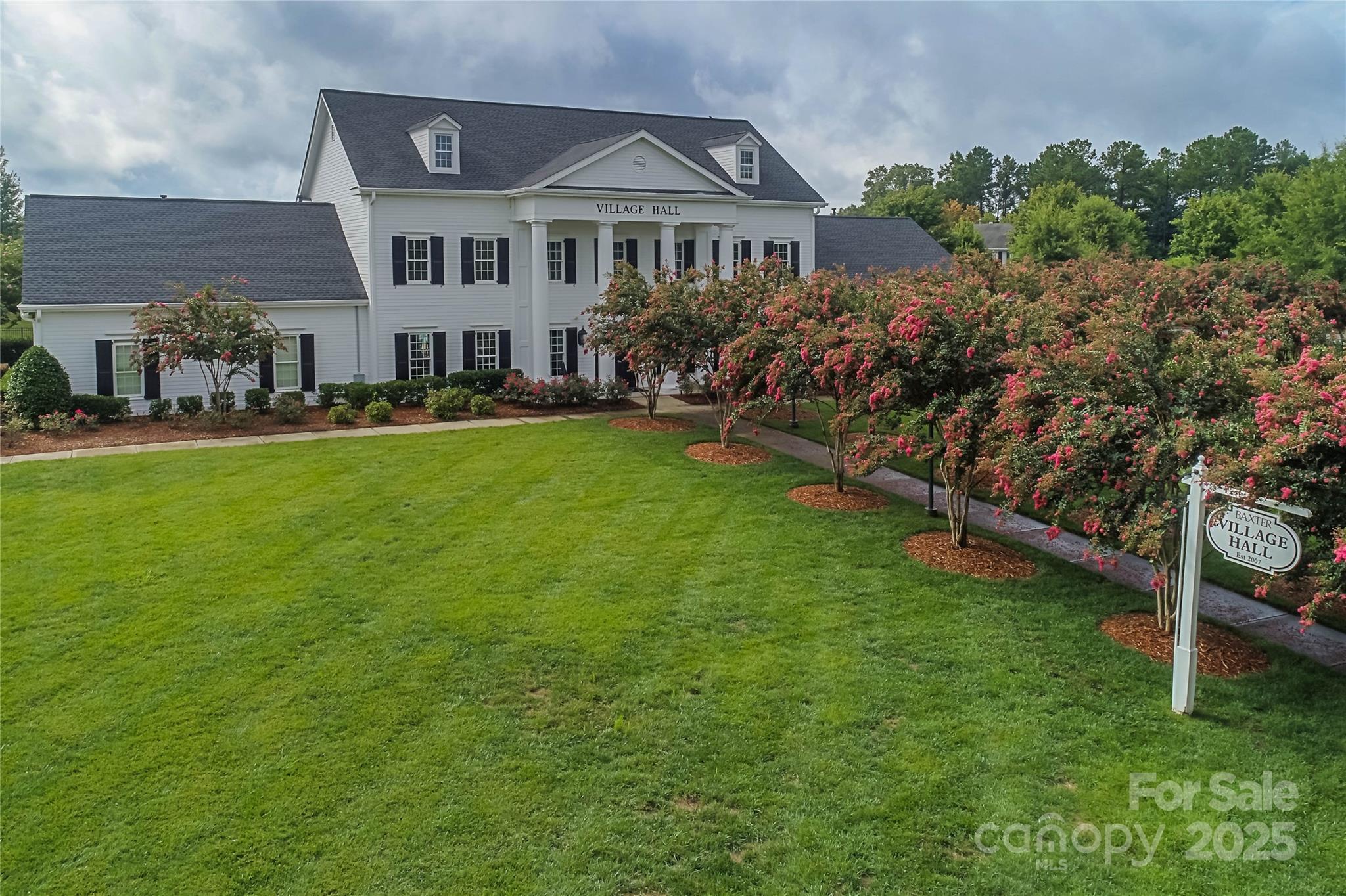 1855 2nd Baxter Crossing Fort Mill, SC 29708 - Photo 46 of 48 a front view of a house with a garden