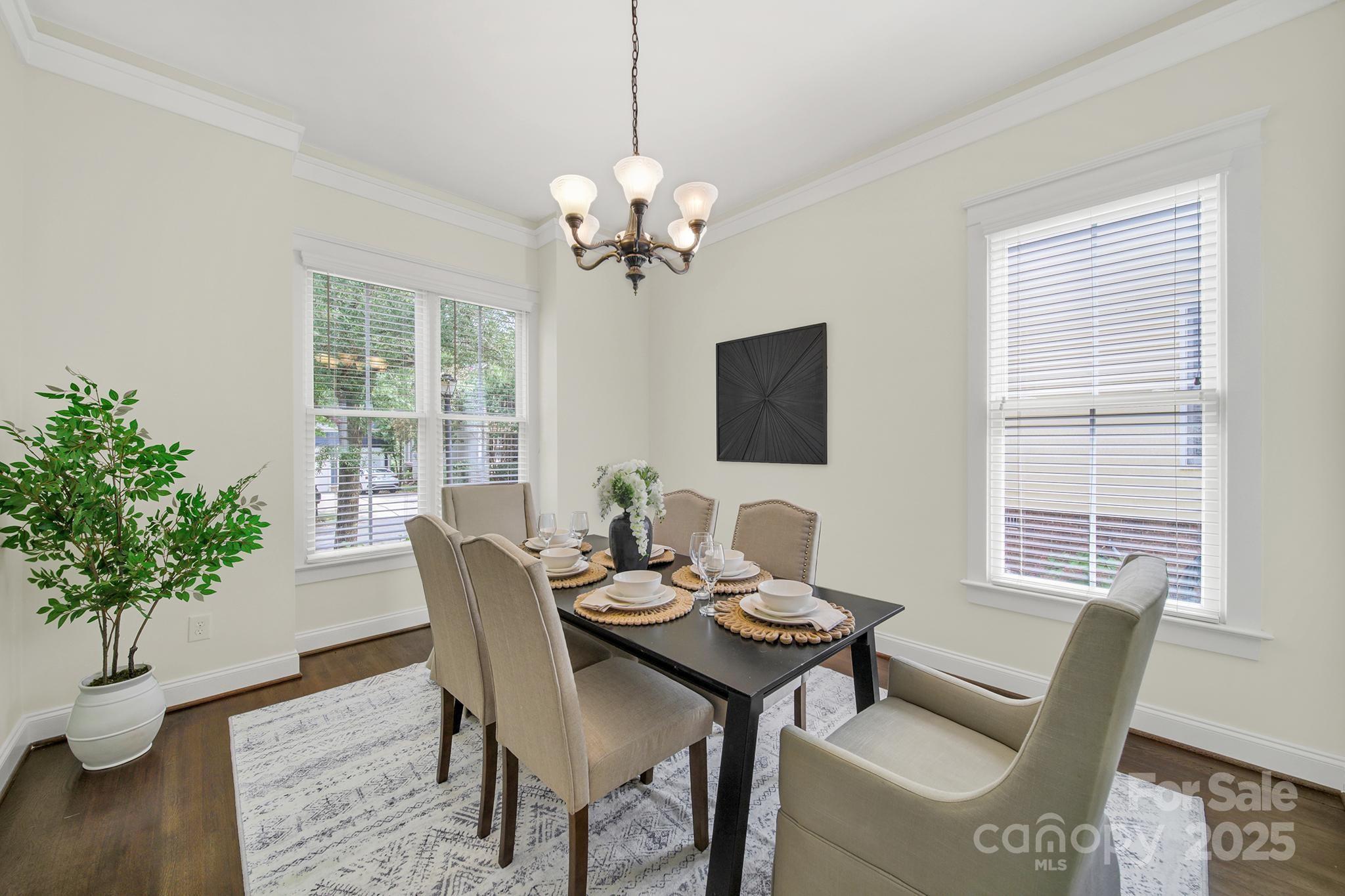 1855 2nd Baxter Crossing Fort Mill, SC 29708 - Photo 8 of 48 a view of a dining room with furniture window and wooden floor