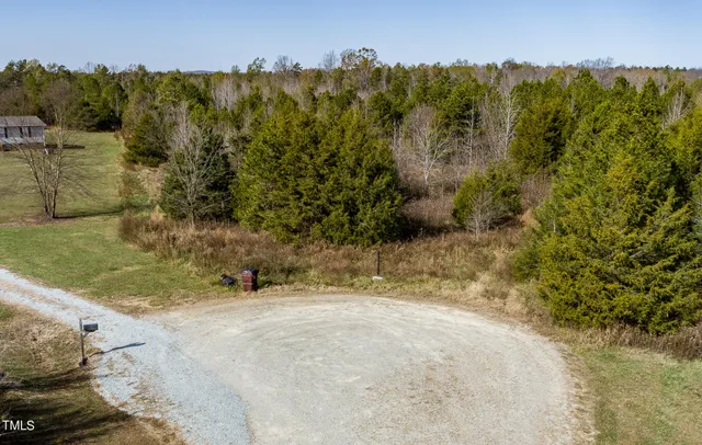 a view of a back yard from a balcony