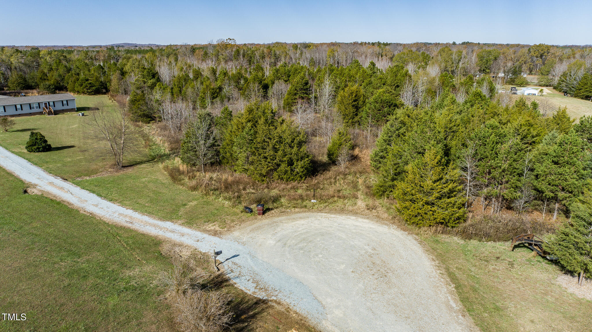 175 Glendale Lane Roxboro, NC 27574 - Photo 4 of 21 a view of a back yard from a balcony