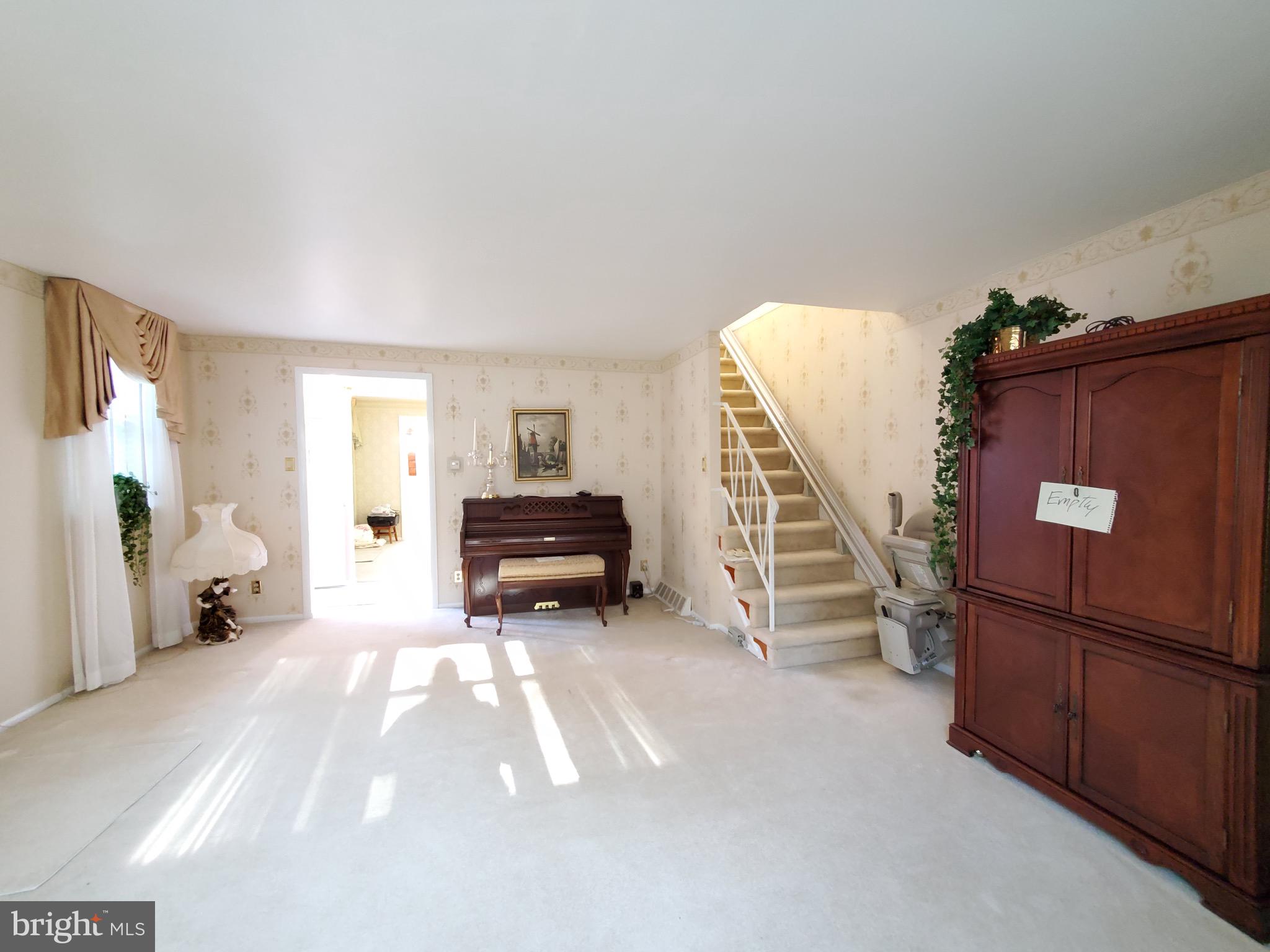 11865 Sewell Road Philadelphia, PA 19116 - Photo 5 of 41 a view of a livingroom with wooden floor and furniture