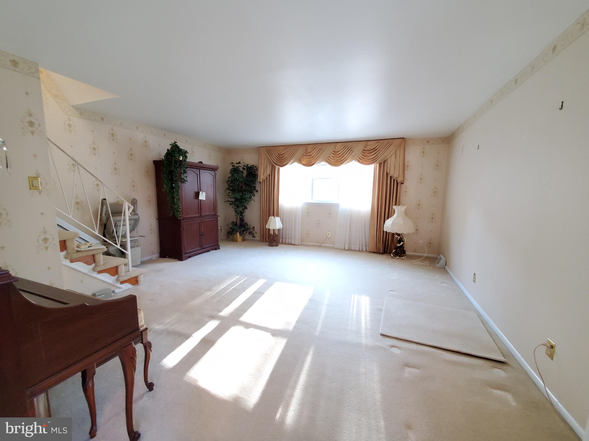 11865 Sewell Road Philadelphia, PA 19116 - Photo 7 of 41 a view of livingroom with furniture and a window