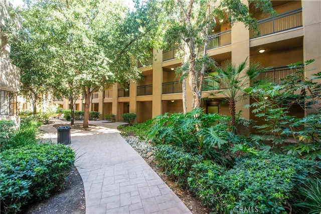 a view of a building with a garden