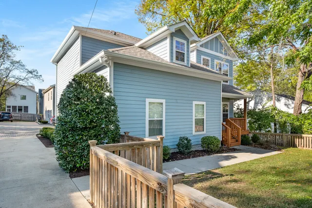 a view of house with outdoor space and yard
