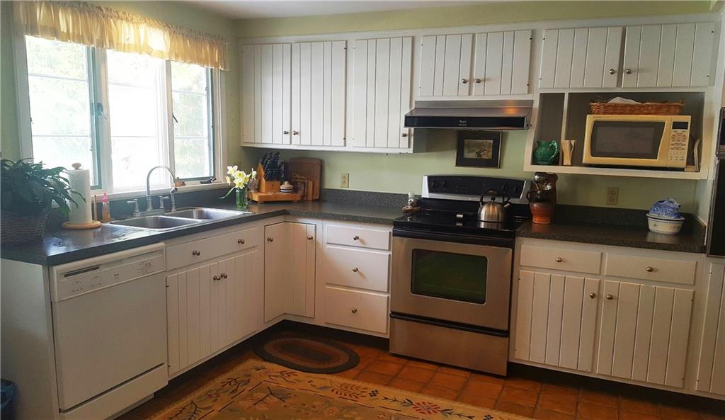 A very large kitchen with plenty of space to cook for large gatherings. Two ovens, two sinks, a pantry, and dining area. This could easily be reconfigured to meet any need you have for your cooking preferences. 