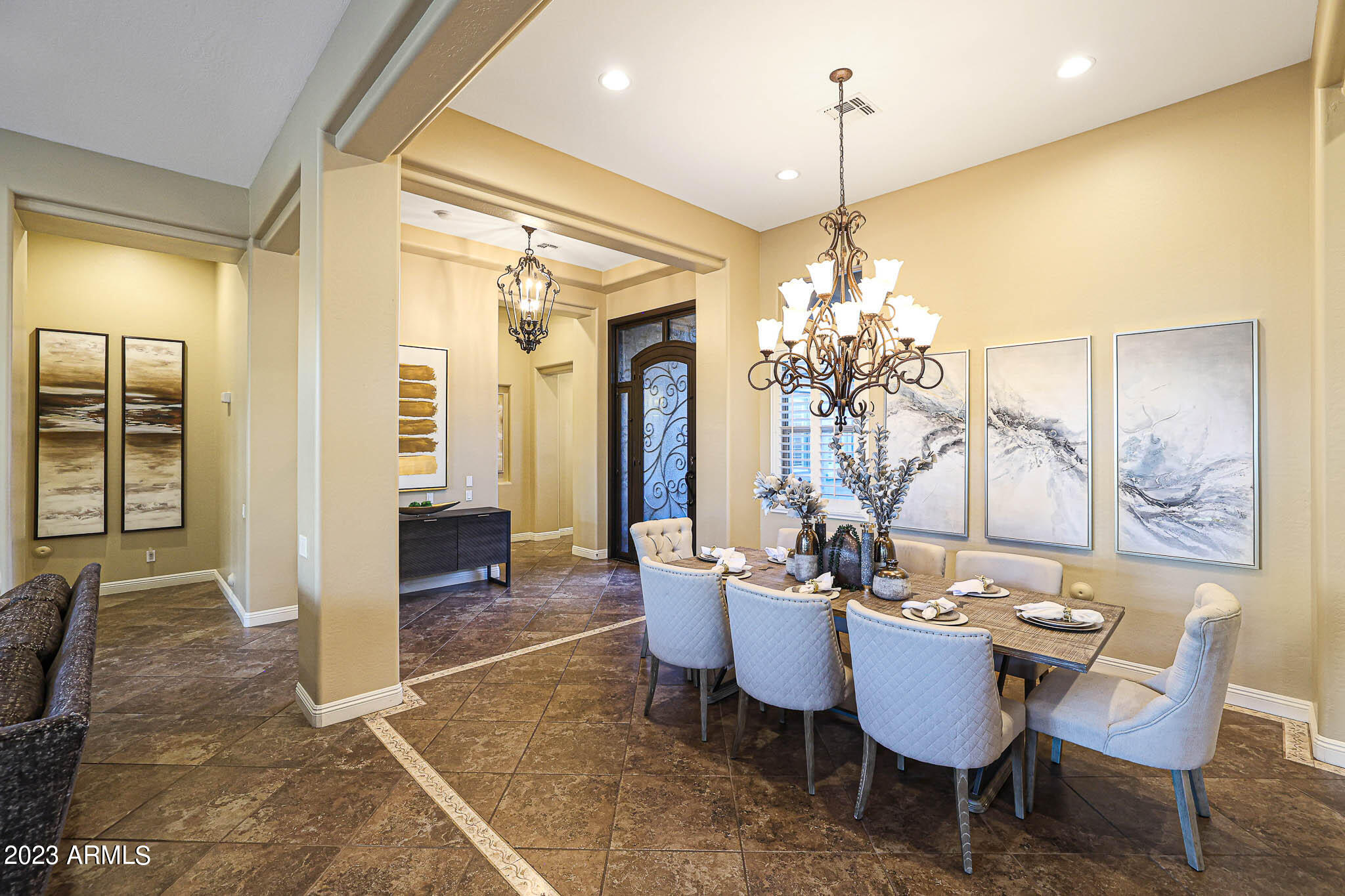 4935 West Yearling Road Phoenix, AZ 85083 - Photo 20 of 57 a view of a dining room with furniture and wooden floor