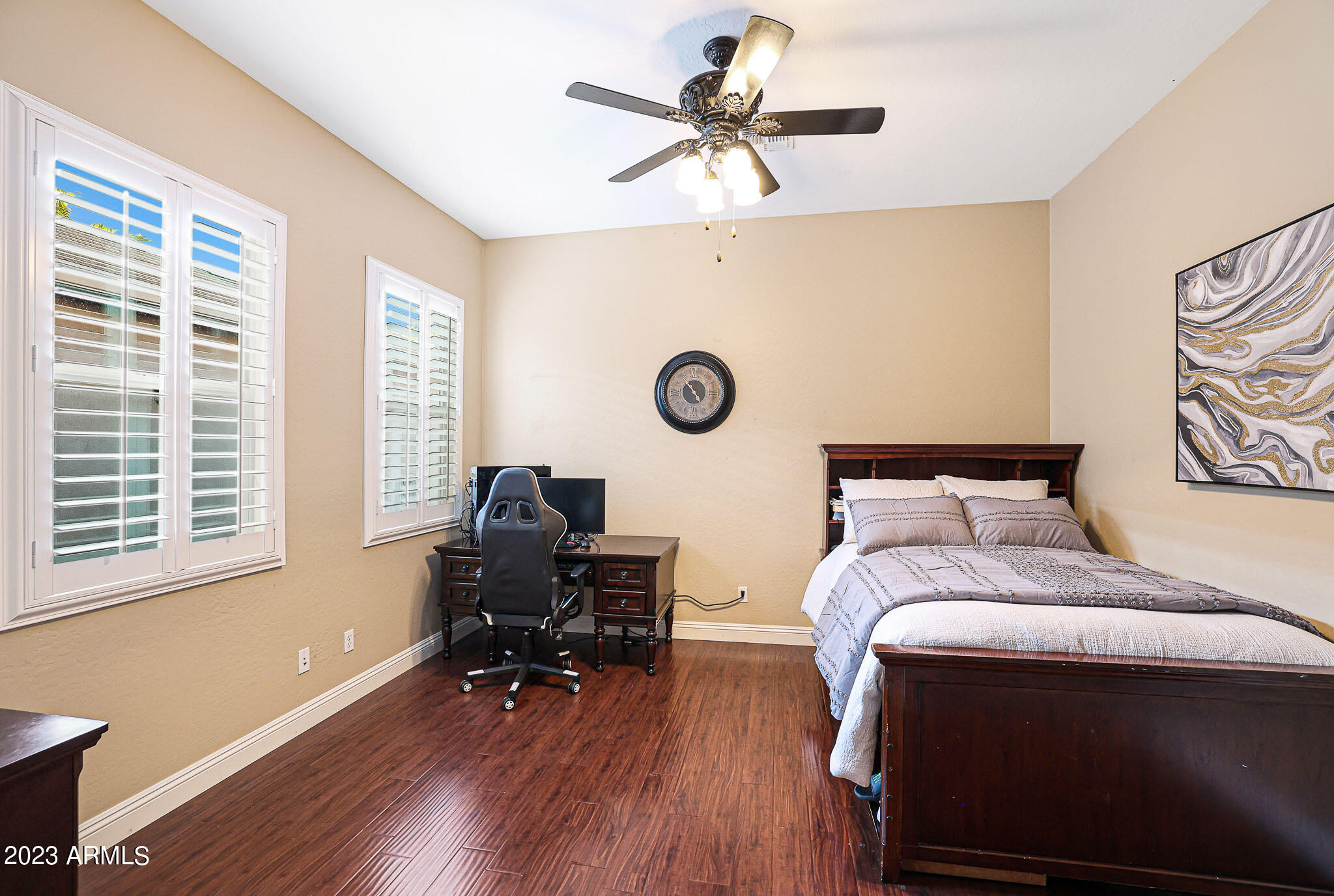 4935 West Yearling Road Phoenix, AZ 85083 - Photo 26 of 57 a bed room with a bed and a window