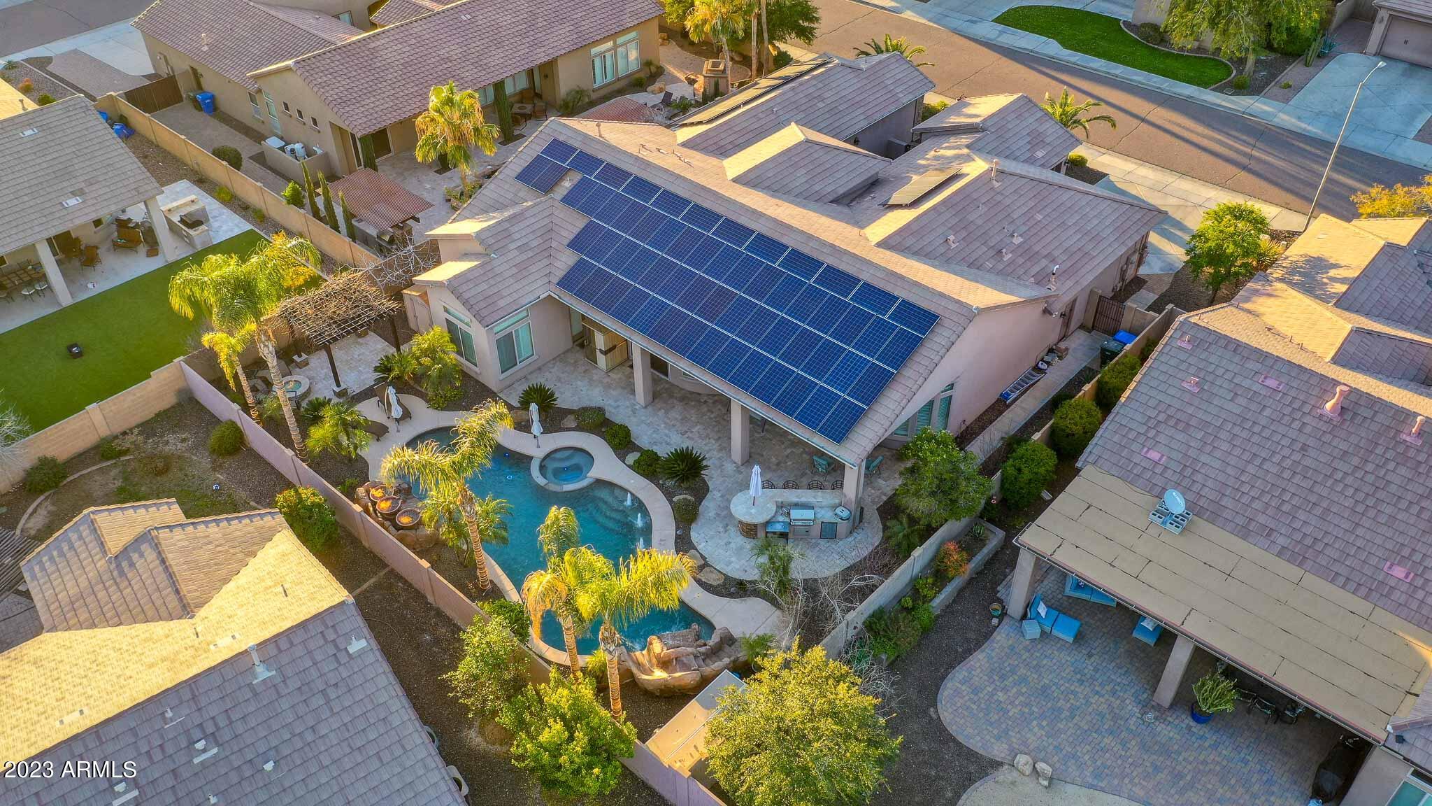 4935 West Yearling Road Phoenix, AZ 85083 - Photo 42 of 57 an aerial view of a house with a swimming pool