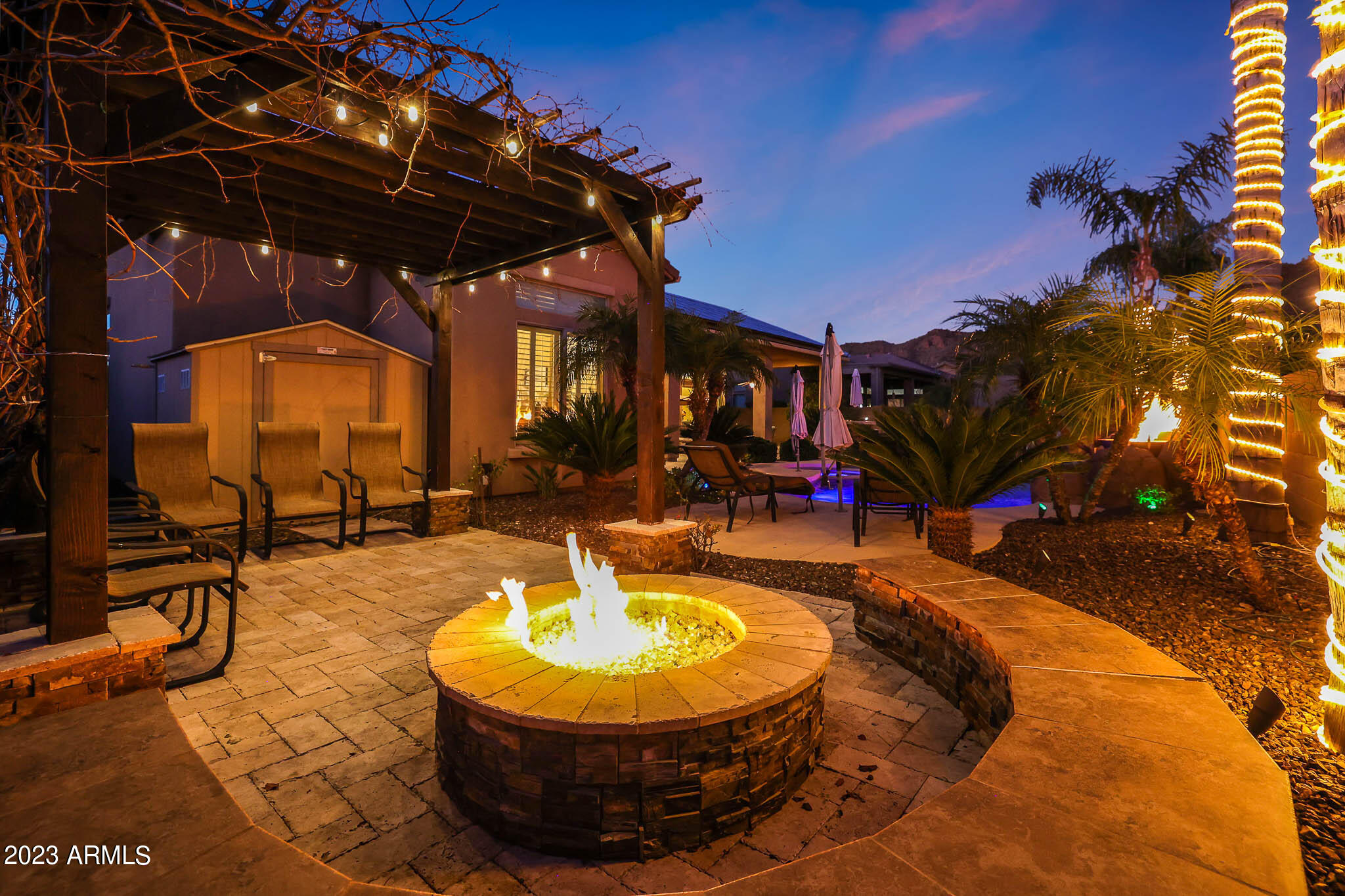 4935 West Yearling Road Phoenix, AZ 85083 - Photo 47 of 57 a view of a swimming pool with sitting area