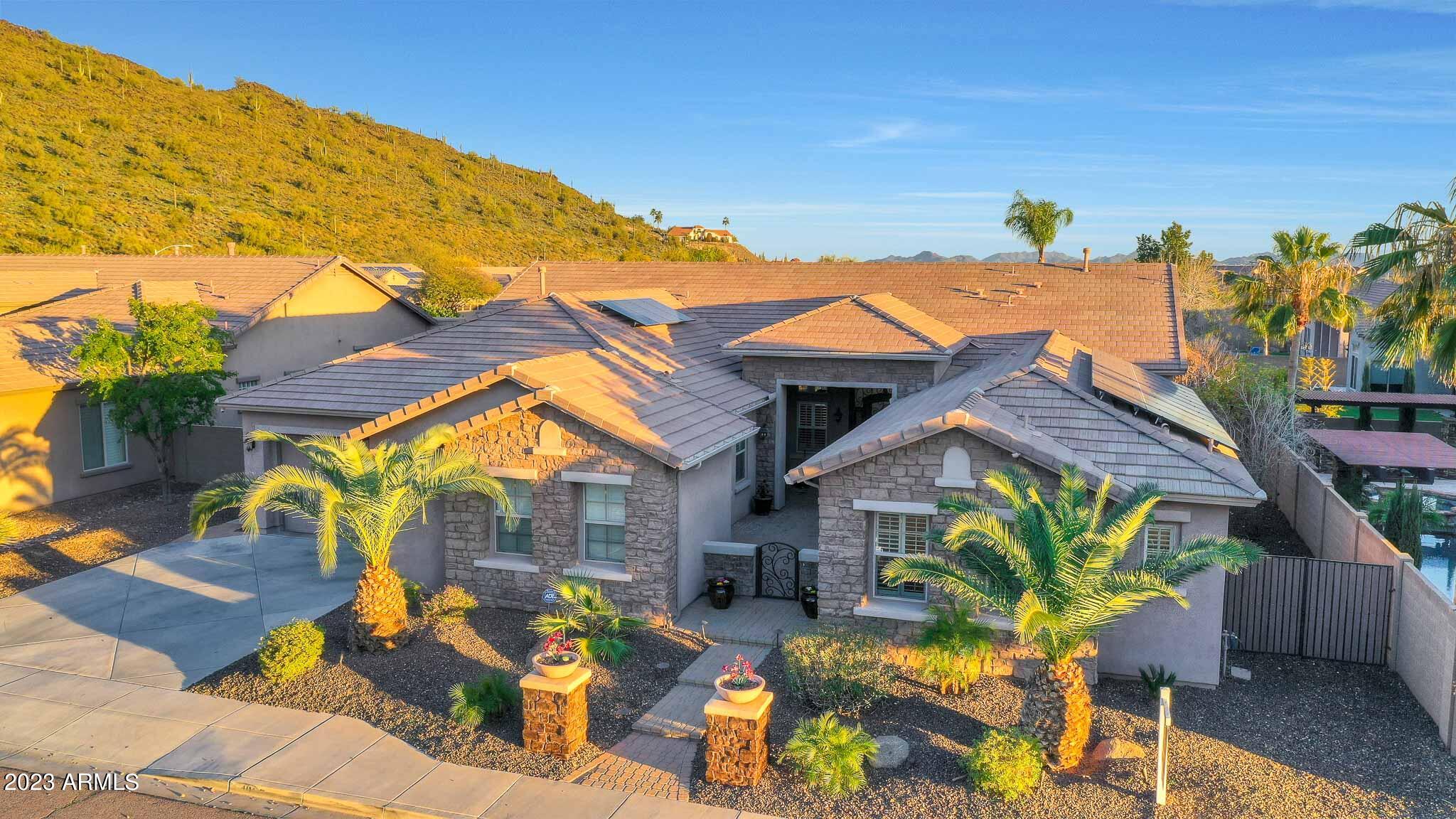 4935 West Yearling Road Phoenix, AZ 85083 - Photo 52 of 57 a view of a chairs and table in the patio