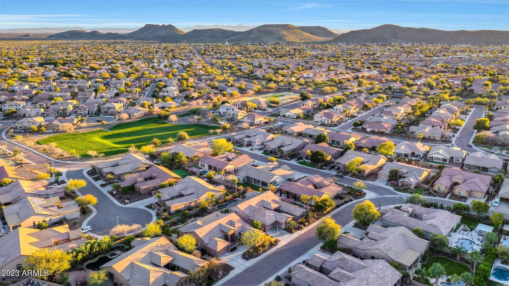 4935 West Yearling Road Phoenix, AZ 85083 - Photo 55 of 57 an aerial view of a city with lots of residential buildings