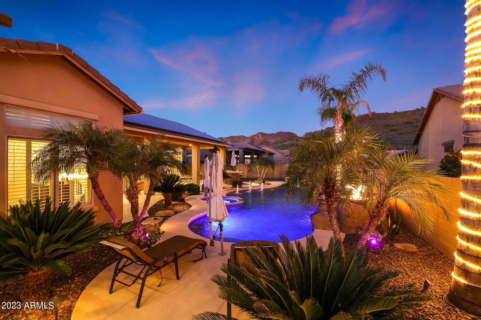 4935 West Yearling Road Phoenix, AZ 85083 - Photo 7 of 57 a view of swimming pool with outdoor seating